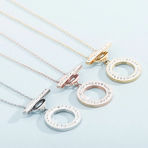 Detailed view of rhinestone circle necklaces in gold, rose gold, and silver with OT toggles