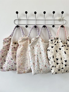Cartoon embossed canvas tote bags with colorful rope handles and floral bear patterns