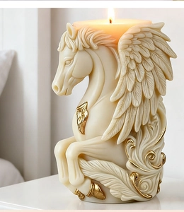 Detailed close-up of a Pegasus candle with elegant gold leaf accents for home decor