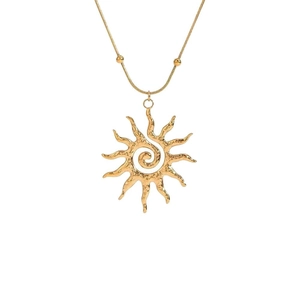 Polished 18K gold plated stainless steel sunburst pendant necklace on white background