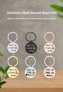 Matrix display of colorful stainless steel round keychains with engraved funny quotes