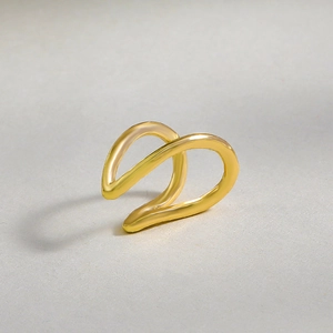 Polished golden double-layer wavy ear cuff jewelry with a minimalist non-pierced design