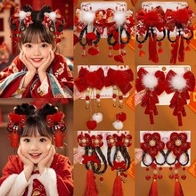 Detailed set of red Chinese New Year hair accessories with tassels and pearls for girls