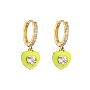 Macro detail of gold hoop earrings featuring neon yellow enamel hearts and white zircon stones