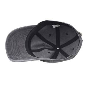 Detail view of the washed grey cotton baseball cap interior showing sewing and buckle