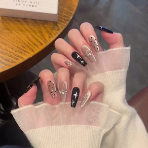 Starry sky and moon cat eye press-on nails in long coffin shape with rhinestones