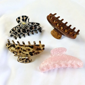 Set van 4 grote haarklemmen van acetaat met luipaard- en schildpadpatronen