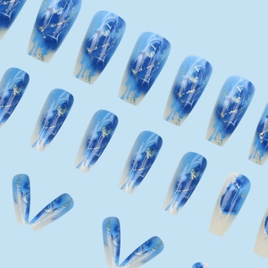 Royal blue and white marble glitter press-on nails with golden accent lines