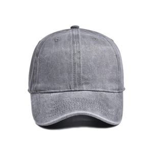 Detail of grey washed cotton baseball cap showing six-panel structure and stitched brim