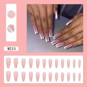Detailed set of 24 long stiletto press-on nails with nude pink base and white V-French tips