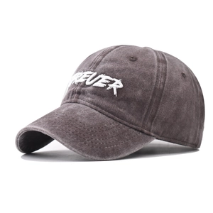 Detail view of washed grey cotton baseball cap with white 3D Forever embroidery