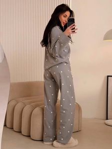 Grey long-sleeve pajama set with white heart print and relaxed wide-leg trousers