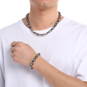 Hip hop style silver stainless steel bamboo link chain necklace and bracelet set on model