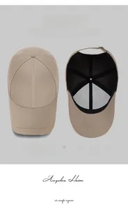 Detail of khaki cotton baseball cap showing interior breathable lining and side embroidery