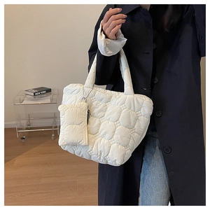 Quilted tote bag with cloud texture and small side pouch in ivory white color