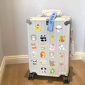 60pcs cute cartoon animal waterproof stickers on a white striped suitcase with a blue strap