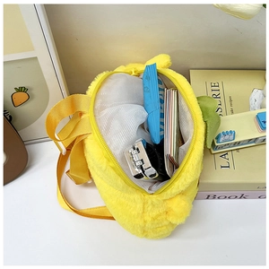Interior view of yellow plush duck backpack showing zipper closure and mesh compartment