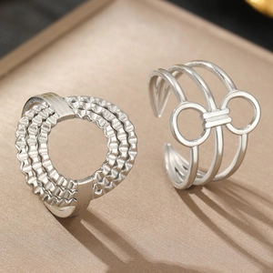 Minimalist silver irregular geometric stainless steel ring set with layered wave texture