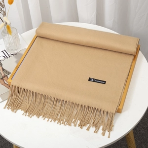 Soft camel cashmere scarf with tassels and thick texture for winter warmth