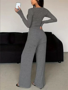 Detail view of the gray knitted lounge set showing the soft texture and relaxed fit