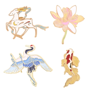 Set of four traditional Chinese enamel pins featuring deer, lotus, crane, and koi fish