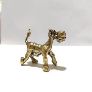 Miniature vintage brass cow figurine with realistic farm animal texture for desktop decor