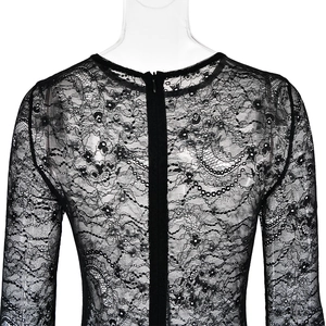 Detail of sheer black floral lace bodysuit with an invisible back zipper closure