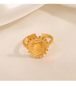 Detail of 18K gold plated heart ring featuring starburst engraving and textured band