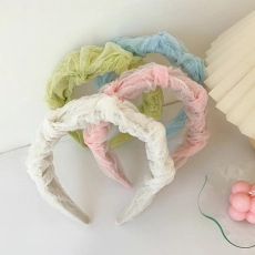 Selectie van pastelkleurige kanten haarbanden in wit, roze, groen en blauw voor dames