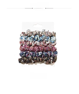 Detail view of 6-piece floral scrunchie set in various colors on display card