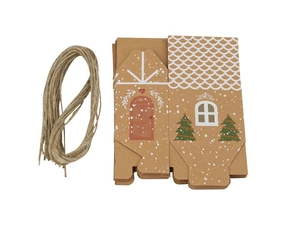 Flat lay of unmounted kraft paper gingerbread house gift boxes with twine and Christmas prints
