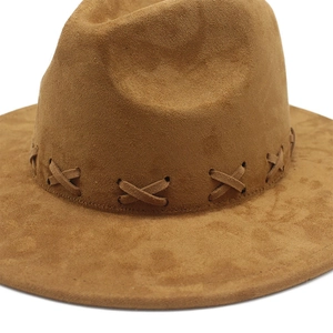 Vintage brown suede fedora hat with cross-stitch band detailing and flat wide brim