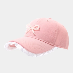Pink cotton baseball cap with white lace brim and pearl bow decoration for women