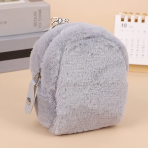 Close-up of a small grey plush backpack coin purse with a metal zipper and keychain