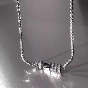 Unisex silver snake chain necklace with sparkling zircon-encrusted multi-ring pendant