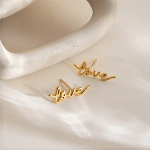 18K gold plated stainless steel love letter stud earrings in elegant cursive style