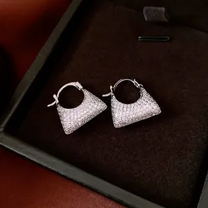 Vintage zircon triangle drop earrings with pave setting in a luxury jewelry box
