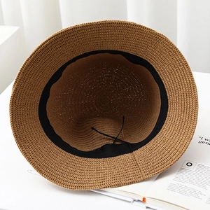Deep camel straw bucket hat with adjustable inner strap and breathable knit design