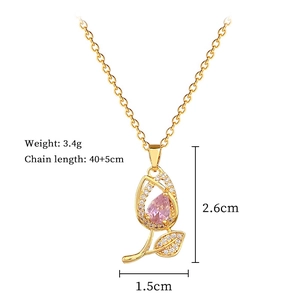 Detail of pink tulip pendant with size and weight specs on gold stainless steel chain