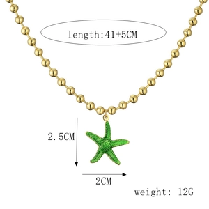 Detailed view of green enamel starfish pendant with gold-plated bead chain measurements