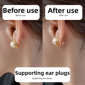 Macro view showing earring stabilizer lift support backs for heavy earrings on earlobe