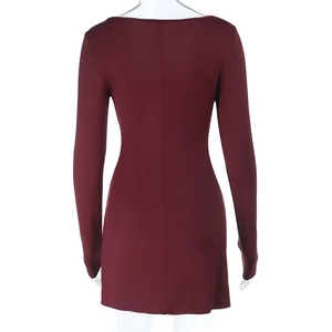 Detail view of burgundy bodycon mini dress showing back stitching and slim fit knit fabric