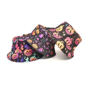 Neon Halloween bucket hats with pumpkin and bat prints shown in a stacked view