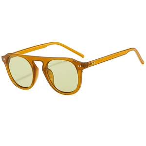 Retro round amber sunglasses with light green lenses and punk metallic rivets detailing