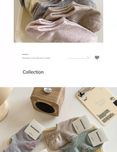 Close-up of multicolored combed cotton low cut socks in various Morandi tones