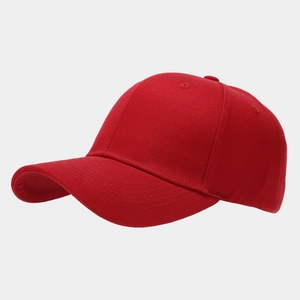 Detail view of red cotton baseball cap with six-panel structure and reinforced hard top brim