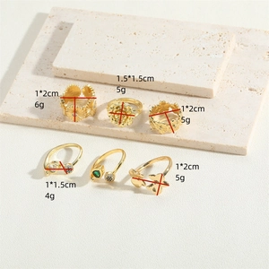 Collection of vintage 14K gold plated flower rings with zircon details and size specs
