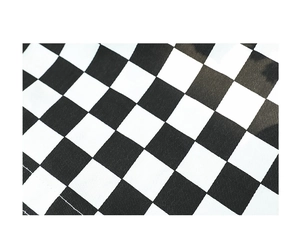 Macro detail of the classic black and white checkered canvas fabric texture on the handbag