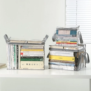 Stack of transparent foldable PVC book storage bags with grey handles for dorm organization