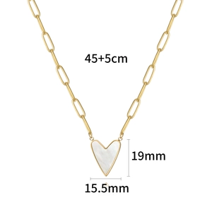 Detail of gold heart pendant necklace with dimensions 19mm and 45cm paperclip chain
